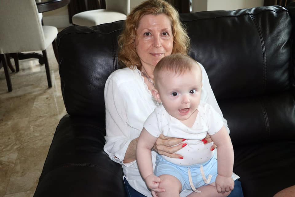 Sharon with a grandchild